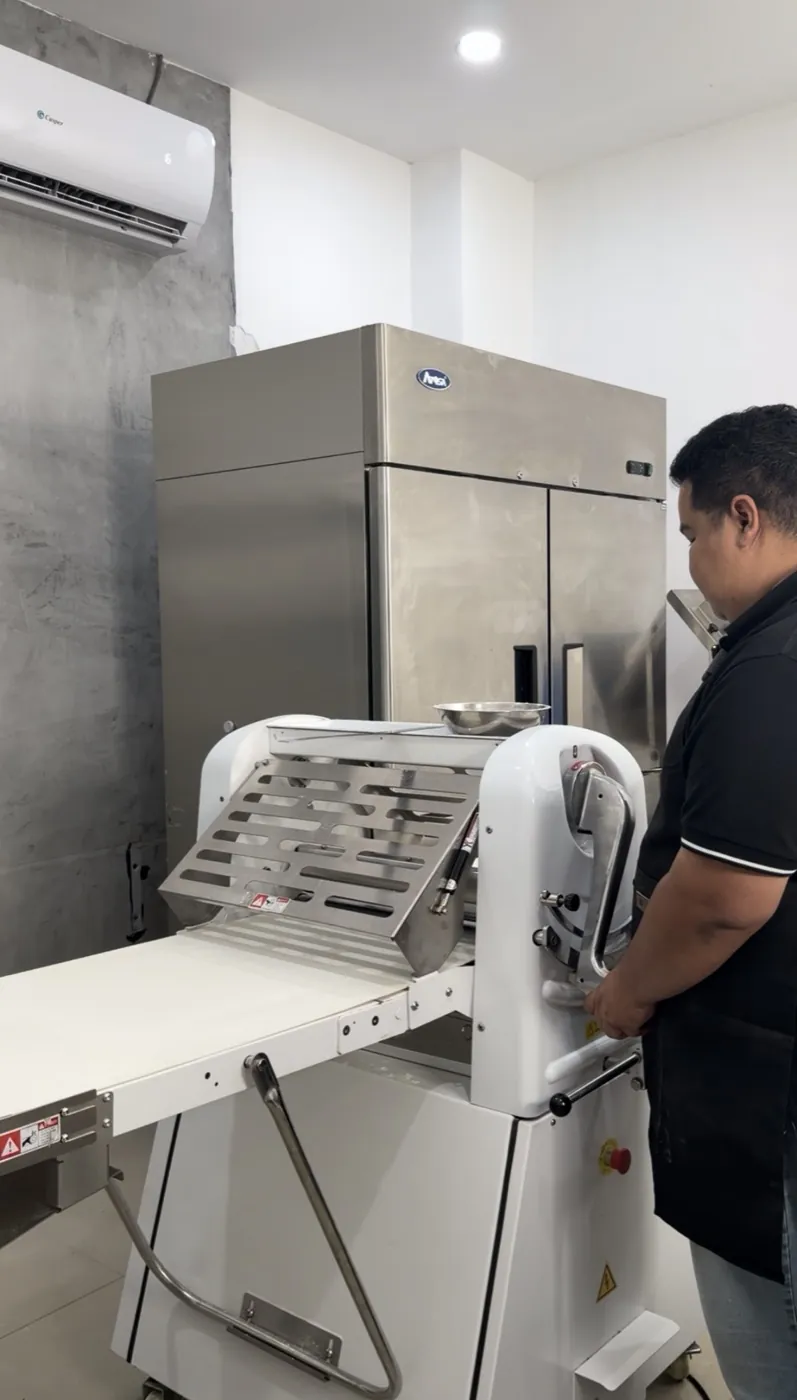 Dough sheeter and bakery workspace